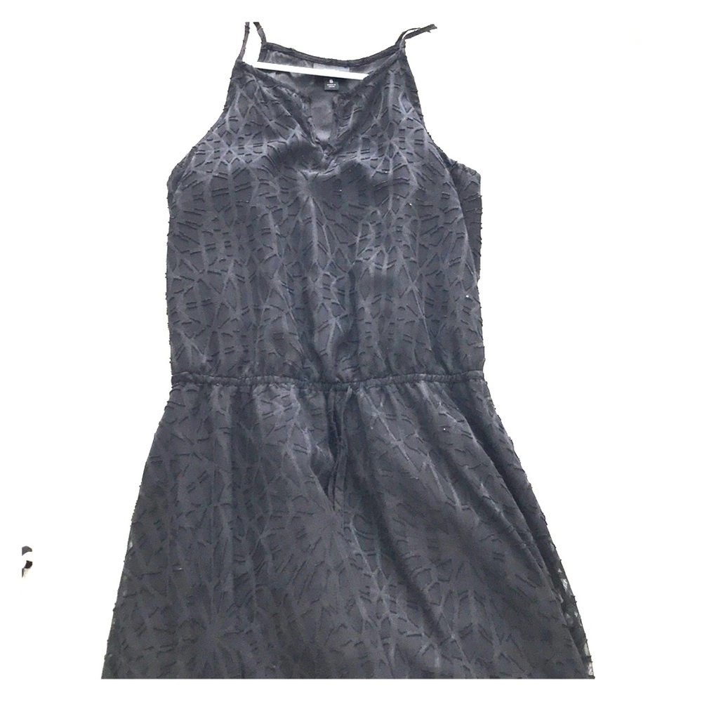 Long black dress. Short slip underneath.